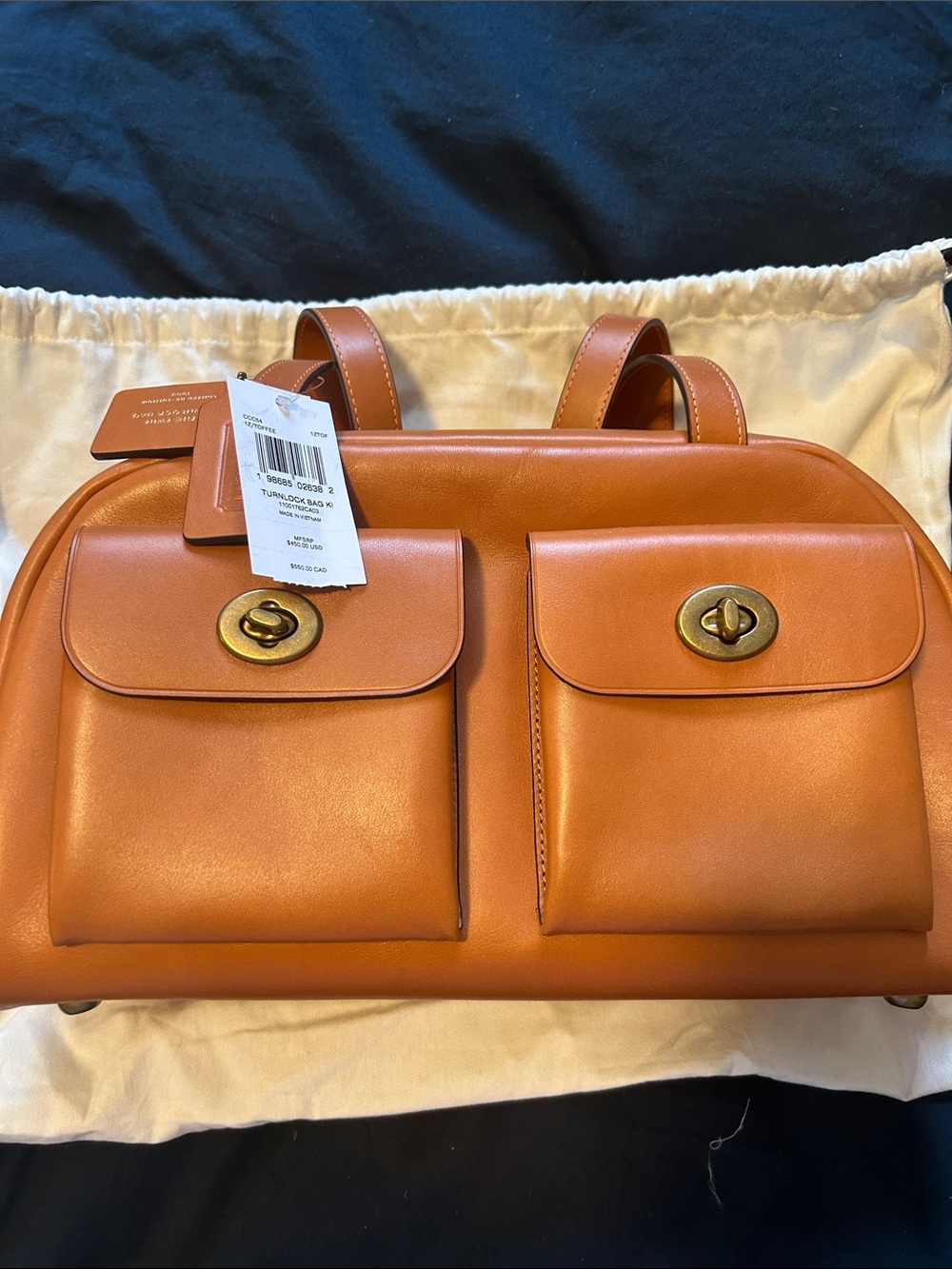 Limit d re-edition twin turnlock with two front pockets